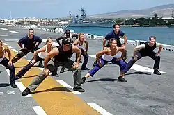 Side split squat at a group calisthenics